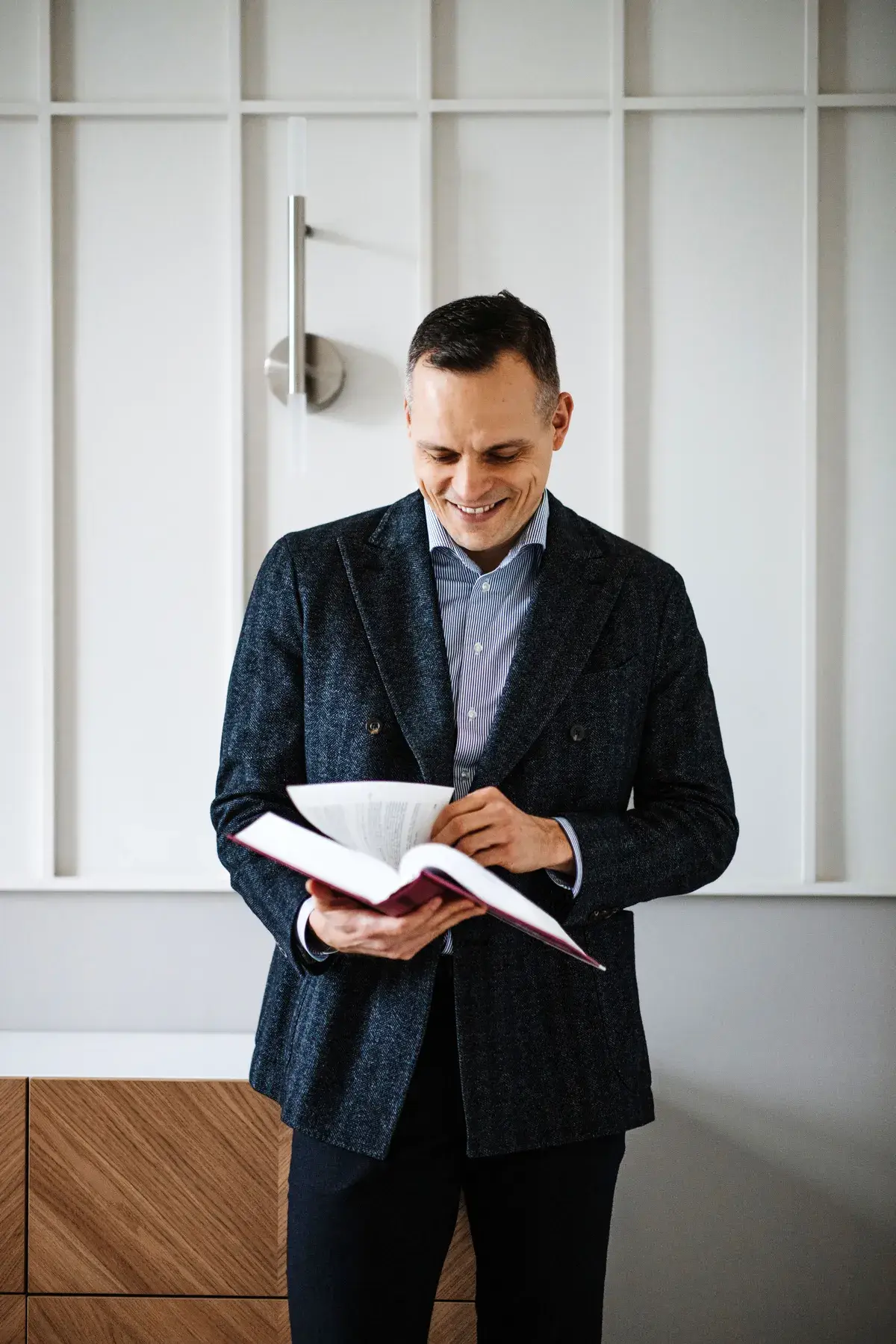 Dr. Artur Barczewski with his monograph on variations in construction contracts